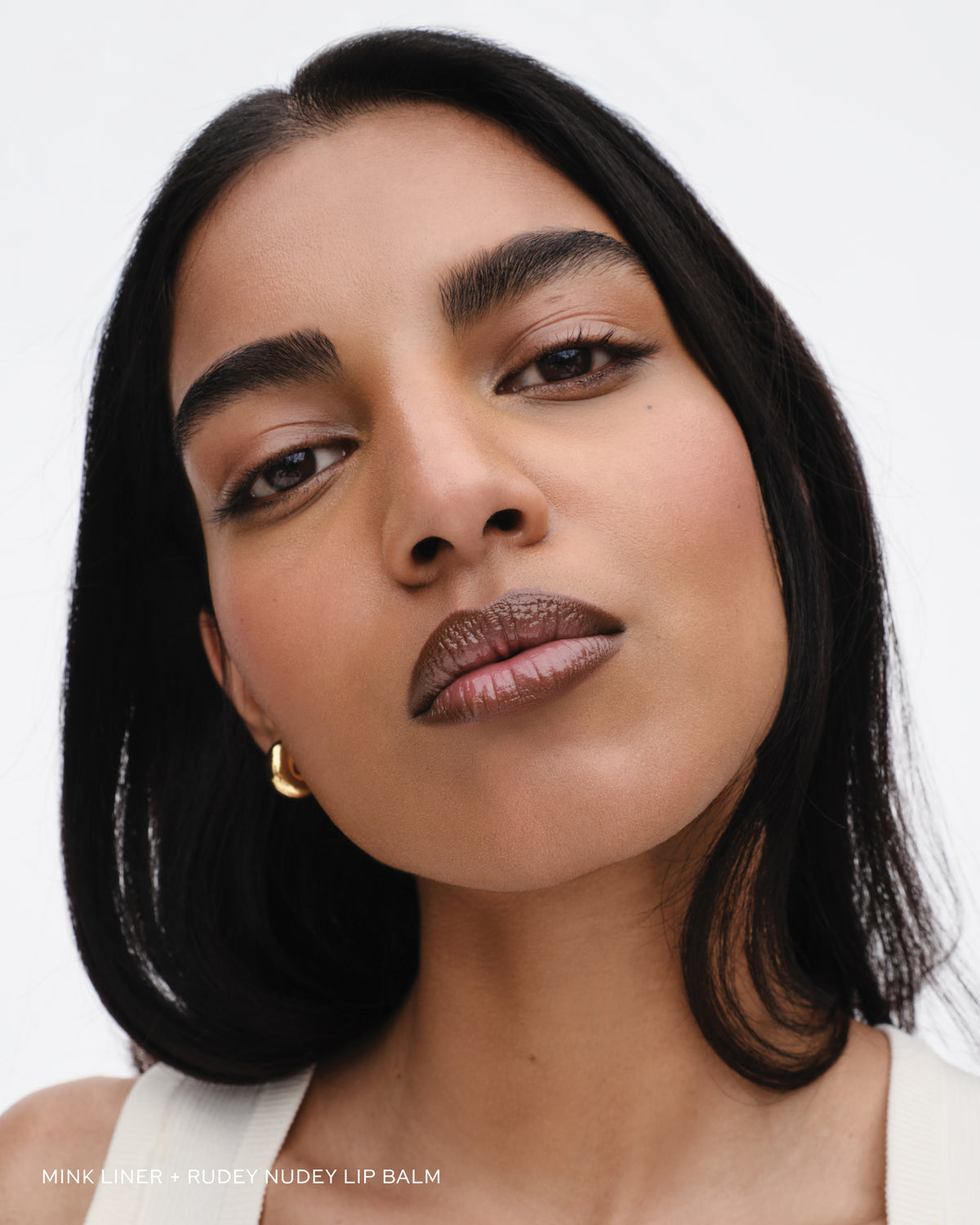 Model wears lip liner in Mink.